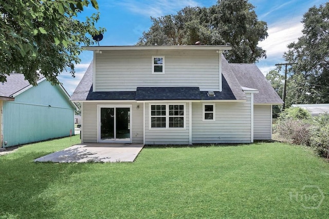 2204 Beaumont Dr, Savannah, GA 31406 - rear view of house with a shingled roof, a patio, and a lawn
