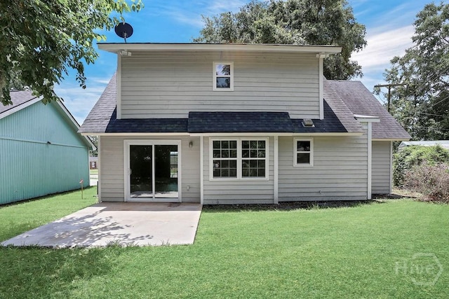 2204 Beaumont Dr, Savannah, GA 31406 - rear view of house with a shingled roof, a lawn, and a patio