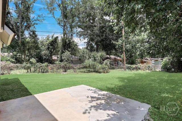2204 Beaumont Dr, Savannah, GA 31406 - view of green lawn featuring a patio