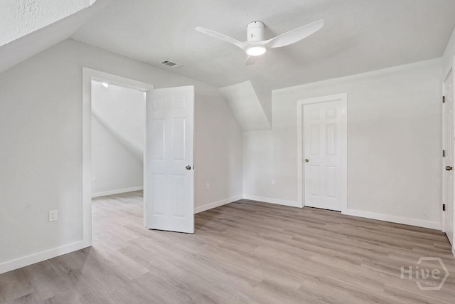 2204 Beaumont Dr, Savannah, GA 31406 - additional living space featuring vaulted ceiling, ceiling fan, wood finished floors, and a textured ceiling