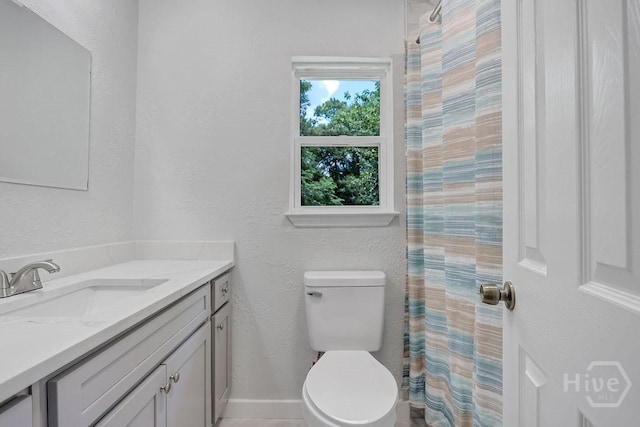 2204 Beaumont Dr, Savannah, GA 31406 - bathroom featuring vanity, a textured wall, and a shower with shower curtain