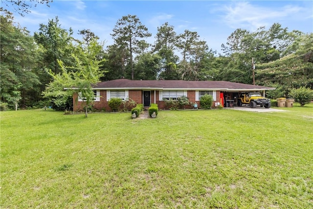 106 S Old Augusta Rd S, Rincon, GA 31326 - single story home featuring an attached carport, a front lawn, and brick siding