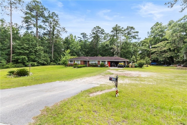 106 S Old Augusta Rd S, Rincon, GA 31326 - ranch-style home featuring dirt driveway and a front yard