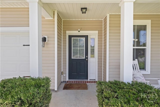 10 Broken Bit Rd, Ellabell, GA 31308 - entrance to property featuring covered porch and a garage