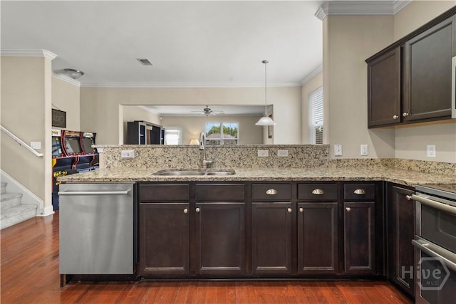 10 Broken Bit Rd, Ellabell, GA 31308 - kitchen with stainless steel appliances, a ceiling fan, dark brown cabinetry, dark wood-type flooring, and ornamental molding