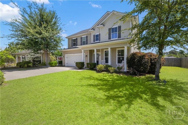 10 Broken Bit Rd, Ellabell, GA 31308 - traditional-style house with driveway, a garage, and covered porch