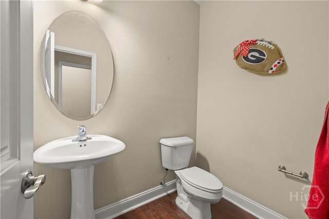 10 Broken Bit Rd, Ellabell, GA 31308 - bathroom with wood finished floors and toilet