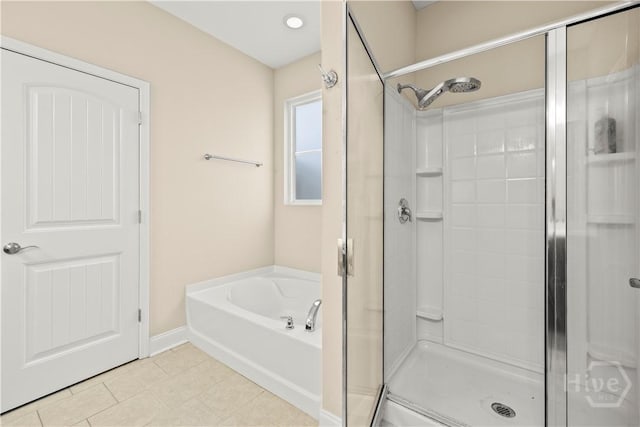 10 Broken Bit Rd, Ellabell, GA 31308 - full bath with a shower stall, a bath, and tile patterned flooring