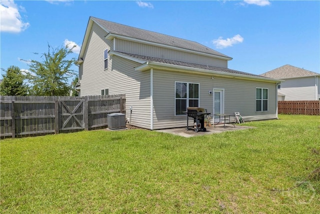 10 Broken Bit Rd, Ellabell, GA 31308 - back of house with a fenced backyard, a patio area, and roof with shingles