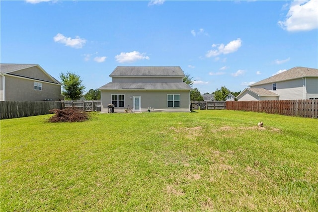 10 Broken Bit Rd, Ellabell, GA 31308 - rear view of house with a fenced backyard
