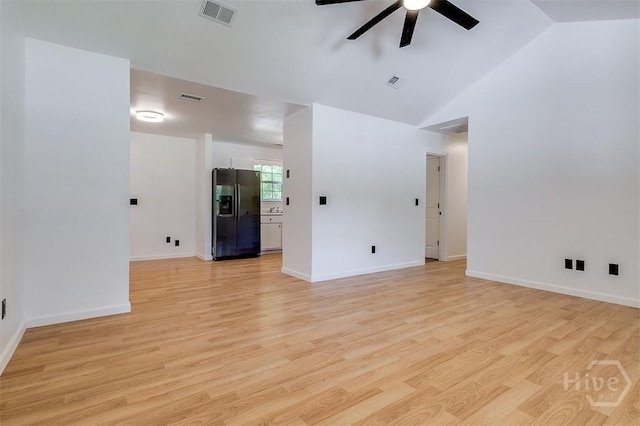208 Lord Effingham Dr, Rincon, GA 31326 - empty room featuring ceiling fan, light wood finished floors, and vaulted ceiling