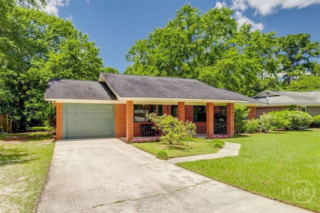 208 Lord Effingham Dr, Rincon, GA 31326 - ranch-style home with a front yard, a garage, concrete driveway, brick siding, and covered porch