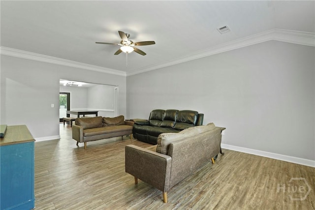 1175 Ralph Rahn Rd, Rincon, GA 31326 - living room with wood finished floors, a ceiling fan, and crown molding