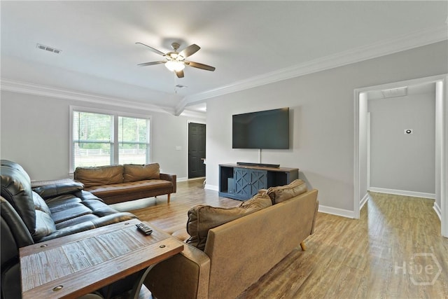 1175 Ralph Rahn Rd, Rincon, GA 31326 - living area with a ceiling fan, crown molding, and light wood-style floors