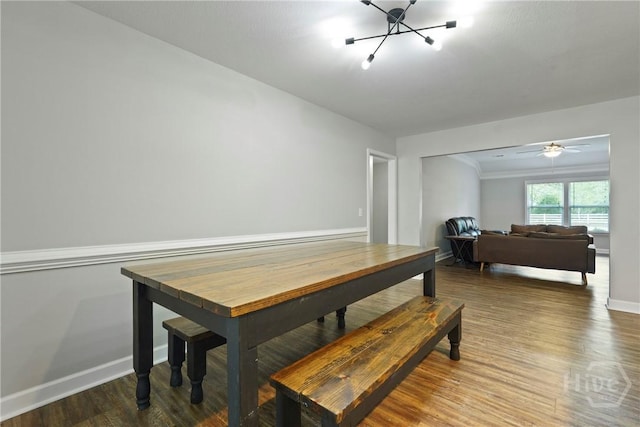 1175 Ralph Rahn Rd, Rincon, GA 31326 - dining area with wood finished floors and a chandelier
