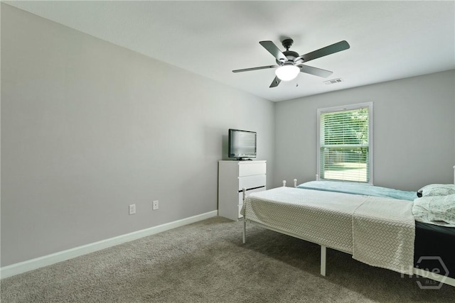 1175 Ralph Rahn Rd, Rincon, GA 31326 - carpeted bedroom featuring baseboards and ceiling fan