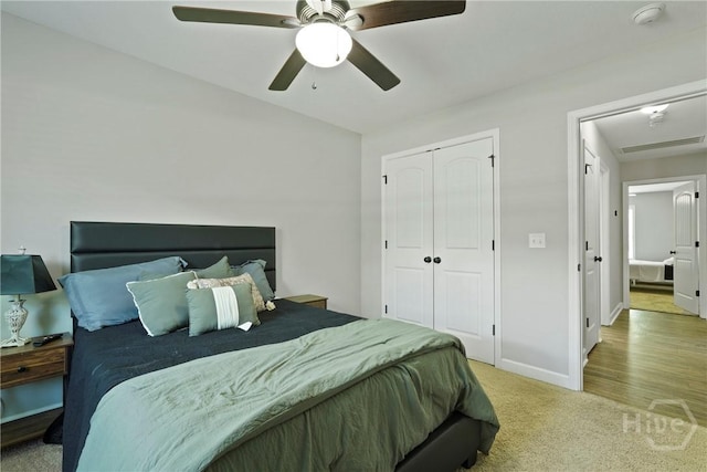 1175 Ralph Rahn Rd, Rincon, GA 31326 - bedroom with light carpet, a closet, and ceiling fan