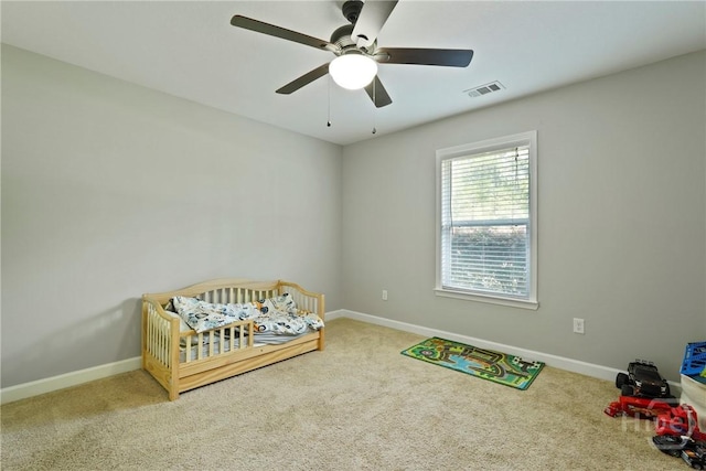 1175 Ralph Rahn Rd, Rincon, GA 31326 - bedroom with carpet floors, a nursery area, and ceiling fan