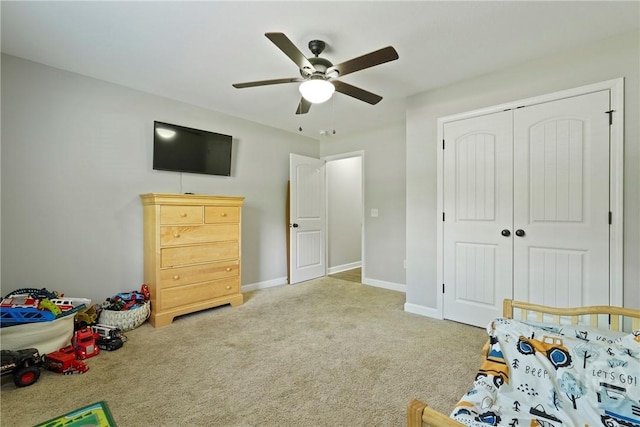 1175 Ralph Rahn Rd, Rincon, GA 31326 - bedroom with carpet flooring, a closet, and ceiling fan