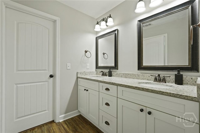 1175 Ralph Rahn Rd, Rincon, GA 31326 - bathroom with double vanity and wood finished floors