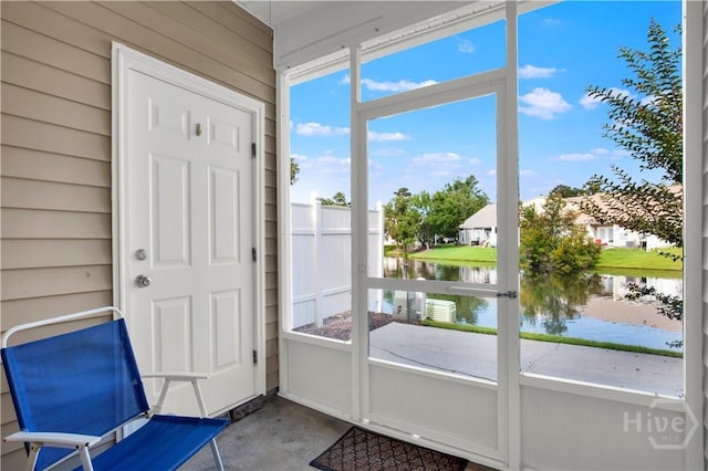 63 Stonelake Cir, Savannah, GA 31419 - unfurnished sunroom featuring a water view