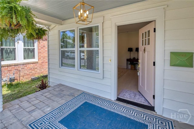 1136 E 39th St, Savannah, GA 31404 - doorway to property featuring brick siding