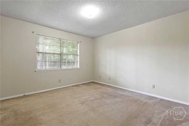 429 Edgewater Rd, Savannah, GA 31406 - carpeted spare room featuring a textured ceiling and baseboards