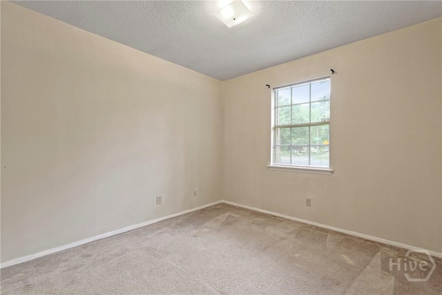 429 Edgewater Rd, Savannah, GA 31406 - carpeted empty room with baseboards and a textured ceiling