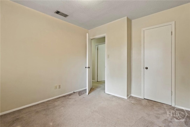 429 Edgewater Rd, Savannah, GA 31406 - unfurnished bedroom with light carpet and a textured ceiling