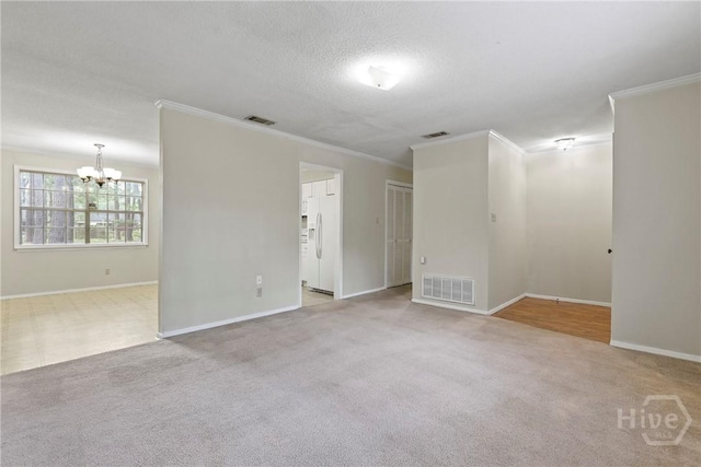 429 Edgewater Rd, Savannah, GA 31406 - spare room with ornamental molding, a chandelier, carpet floors, and a textured ceiling
