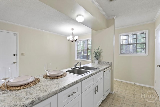 429 Edgewater Rd, Savannah, GA 31406 - kitchen featuring dishwasher, a chandelier, a textured ceiling, light countertops, and white cabinets