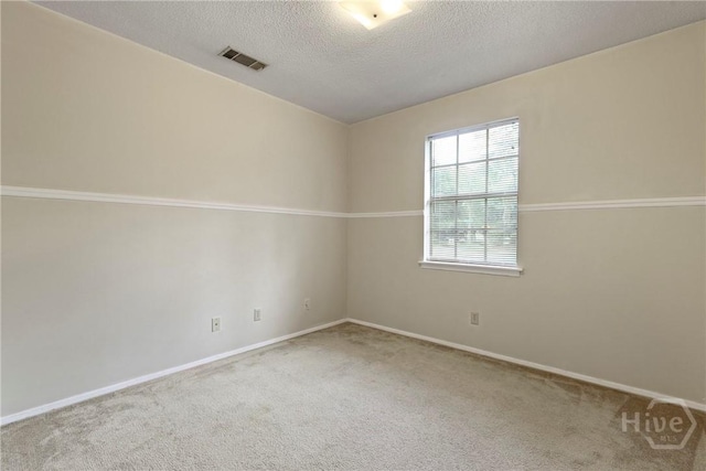 429 Edgewater Rd, Savannah, GA 31406 - carpeted spare room featuring a textured ceiling and baseboards