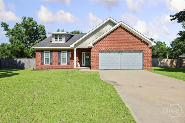 43 Gracie Ln NE, Ludowici, GA 31316 - view of front of house with an attached garage, brick siding, driveway, and a shingled roof