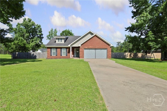 43 Gracie Ln NE, Ludowici, GA 31316 - view of front of home with brick siding, an attached garage, and driveway