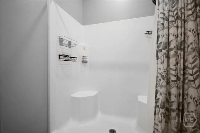 43 Gracie Ln NE, Ludowici, GA 31316 - bathroom featuring curtained shower