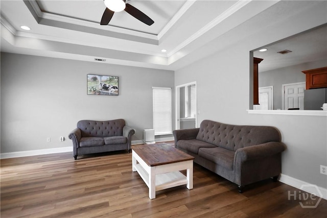43 Gracie Ln NE, Ludowici, GA 31316 - living room featuring ornamental molding, a ceiling fan, wood finished floors, recessed lighting, and a raised ceiling
