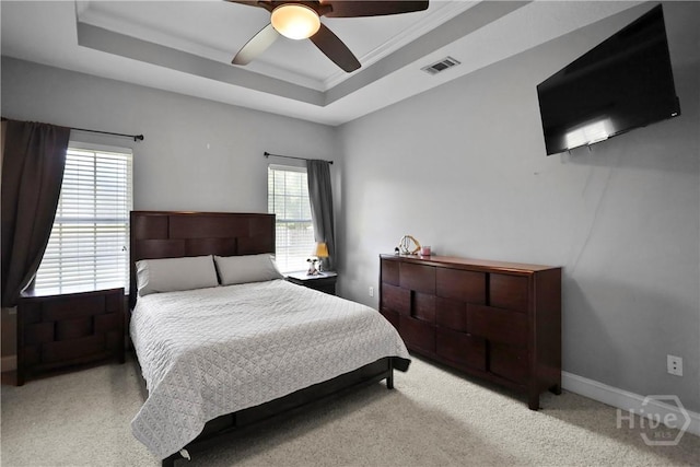 43 Gracie Ln NE, Ludowici, GA 31316 - carpeted bedroom featuring a raised ceiling, ceiling fan, and ornamental molding