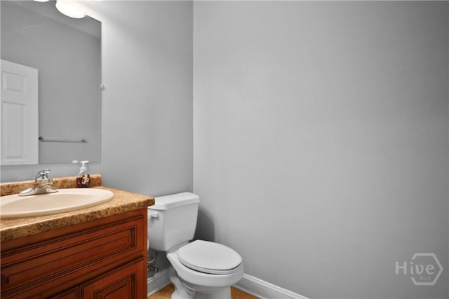43 Gracie Ln NE, Ludowici, GA 31316 - half bathroom featuring toilet and vanity
