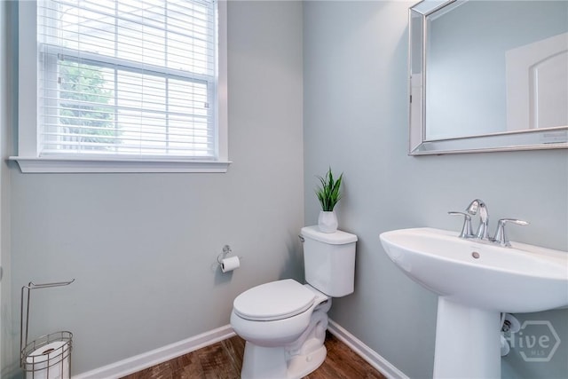 55 Glen Way, Richmond Hill, GA 31324 - bathroom featuring wood finished floors and toilet