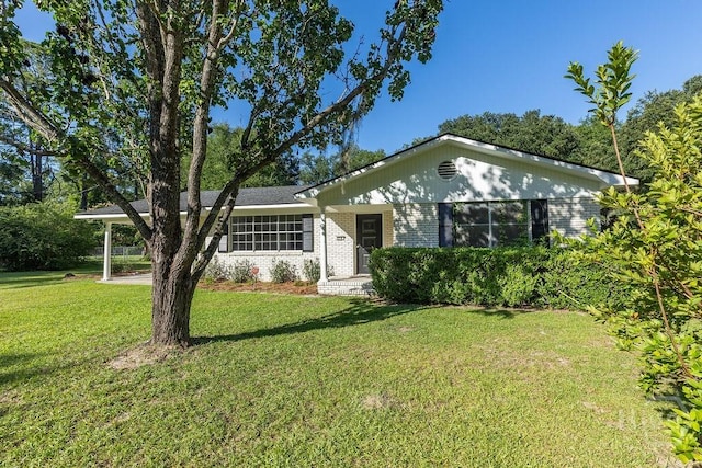84 Poplar St, Guyton, GA 31312 - single story home featuring brick siding and a front lawn