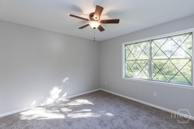 84 Poplar St, Guyton, GA 31312 - empty room featuring carpet and ceiling fan