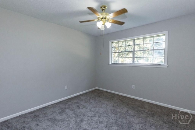 84 Poplar St, Guyton, GA 31312 - empty room featuring carpet floors and a ceiling fan