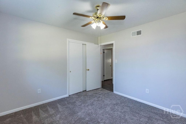 84 Poplar St, Guyton, GA 31312 - unfurnished bedroom featuring carpet, a closet, and a ceiling fan