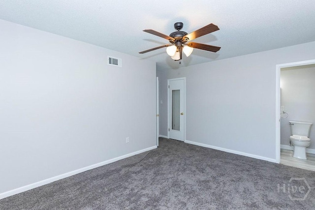 84 Poplar St, Guyton, GA 31312 - unfurnished bedroom with carpet floors, connected bathroom, and ceiling fan