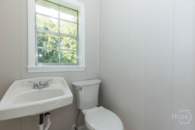 84 Poplar St, Guyton, GA 31312 - bathroom with toilet and a sink
