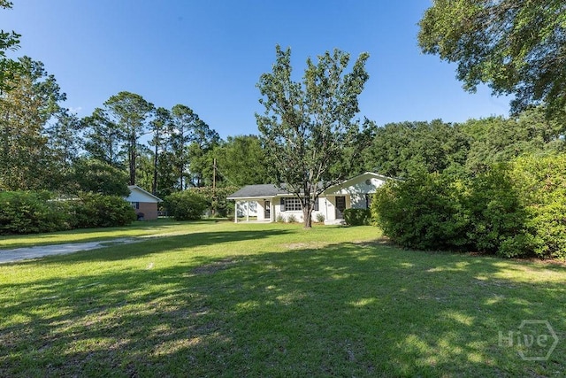 84 Poplar St, Guyton, GA 31312 - view of grassy yard