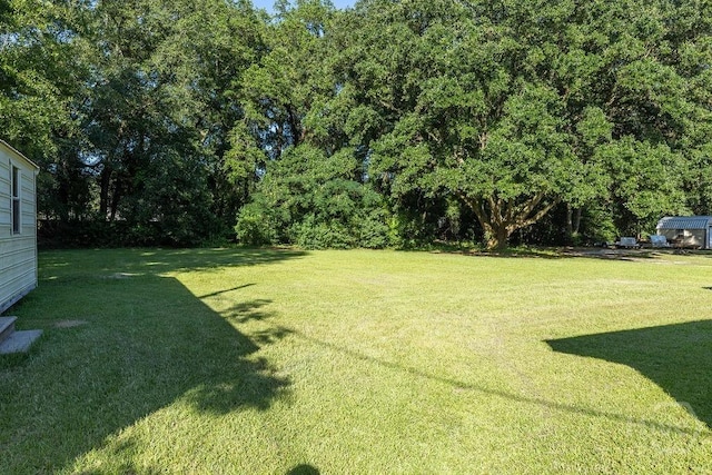 84 Poplar St, Guyton, GA 31312 - view of grassy yard