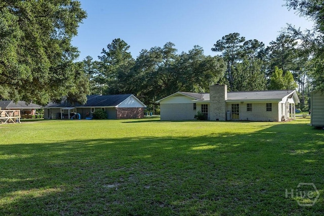 84 Poplar St, Guyton, GA 31312 - view of grassy yard