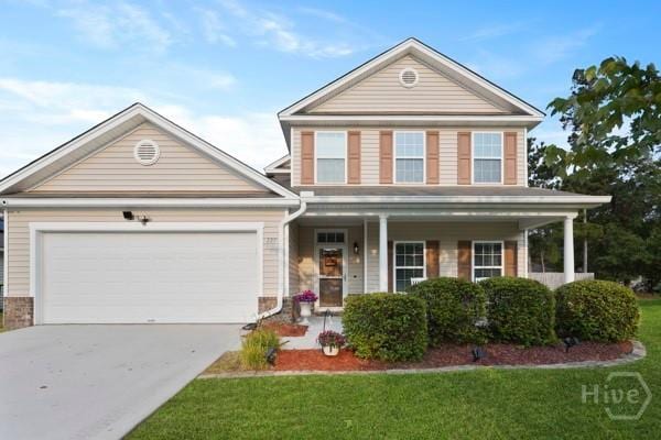 227 Chippingwood Cir, Pooler, GA 31322 - traditional-style house with covered porch, driveway, a garage, and a front yard