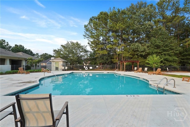 227 Chippingwood Cir, Pooler, GA 31322 - community pool featuring a pergola and a patio